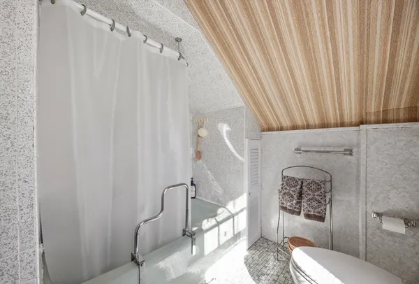 a bathroom with a sink a vanity and a mirror