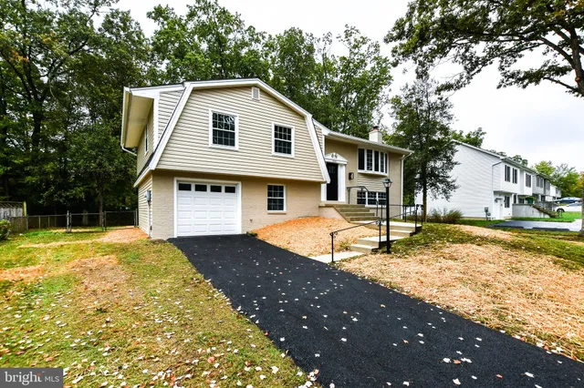 a view of a house with swimming pool