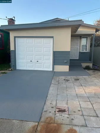 a view of backyard of garage