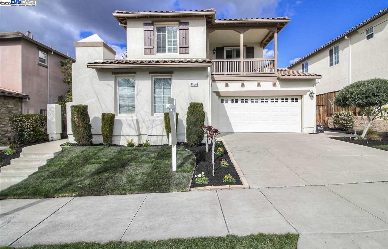 a front view of a house with entertaining space