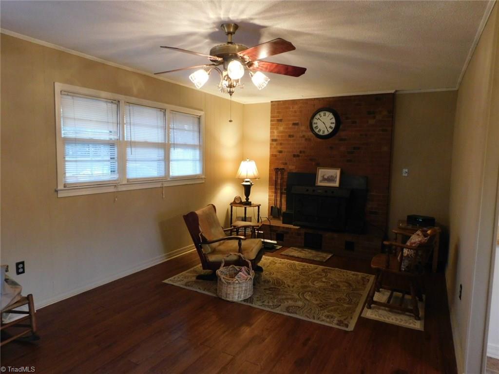 1926 Hill Road Lexington, NC 27292 - Photo 3 of 18 LIVING ROOM WITH WOODSTOVE