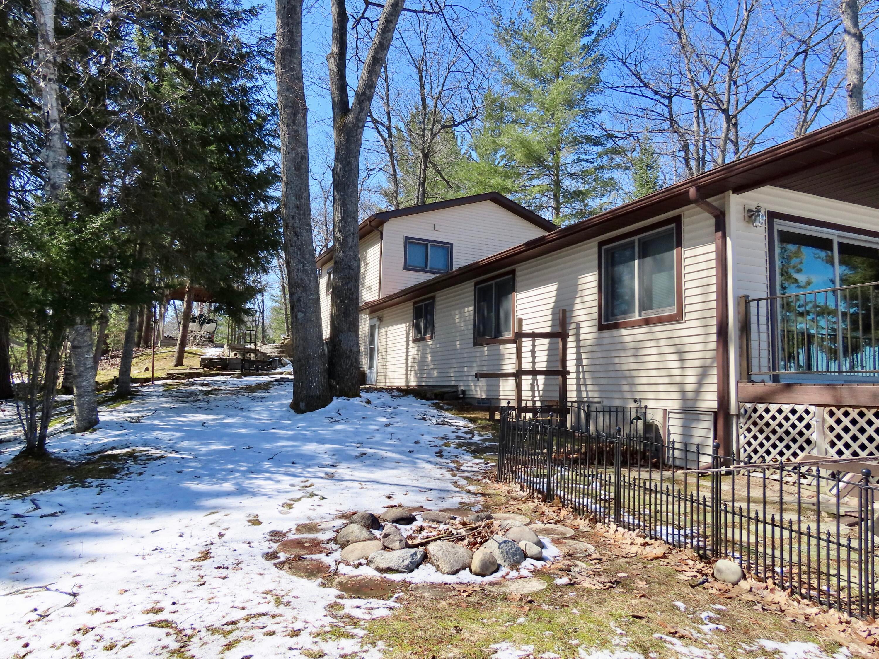 14150 Pointe Road Atlanta, MI 49709 - Photo 44 of 85 side yard