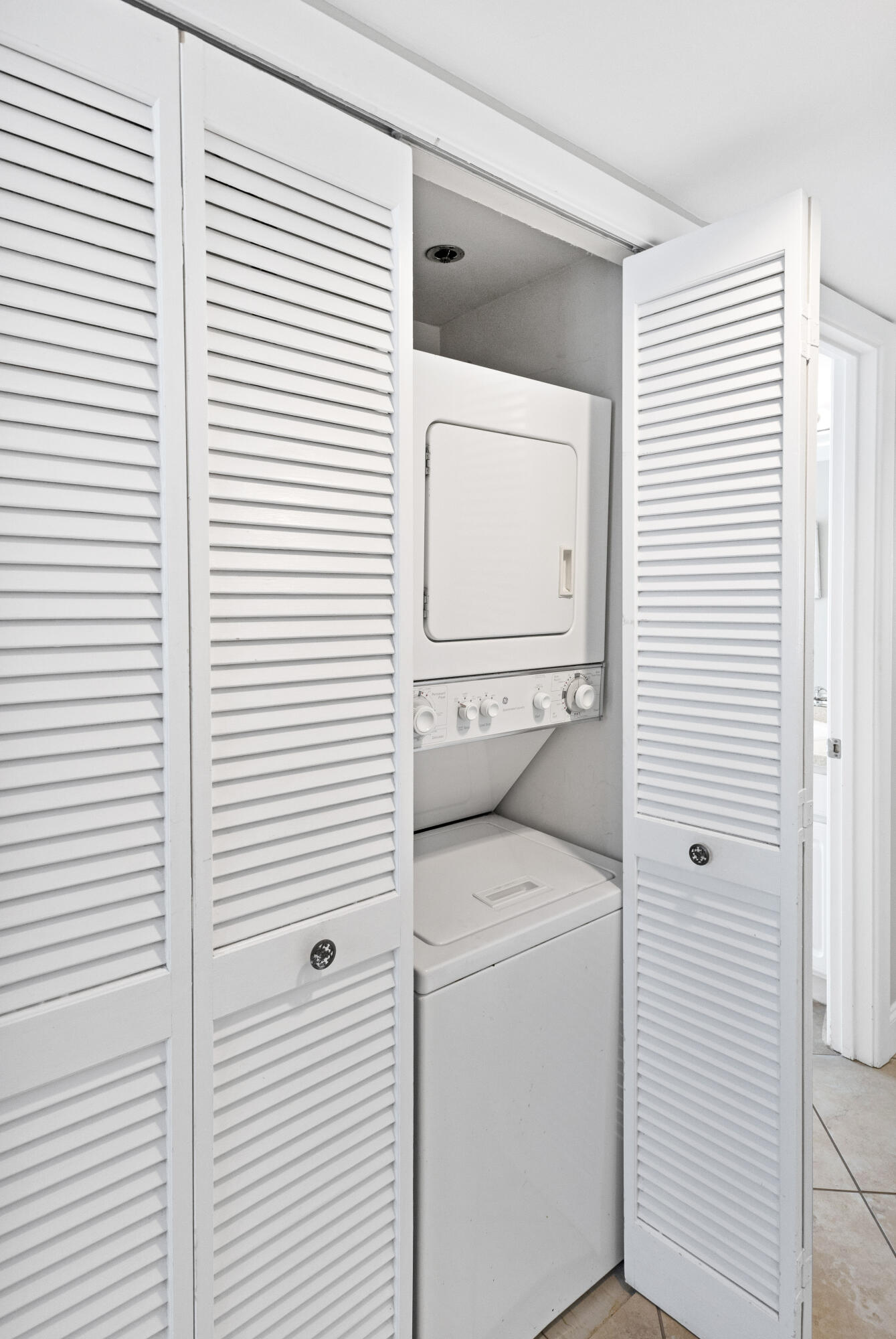 4299 Beachside 2, Unit 4299 Miramar Beach, FL 32550 - Photo 11 of 43 a utility room with dryer and washer
