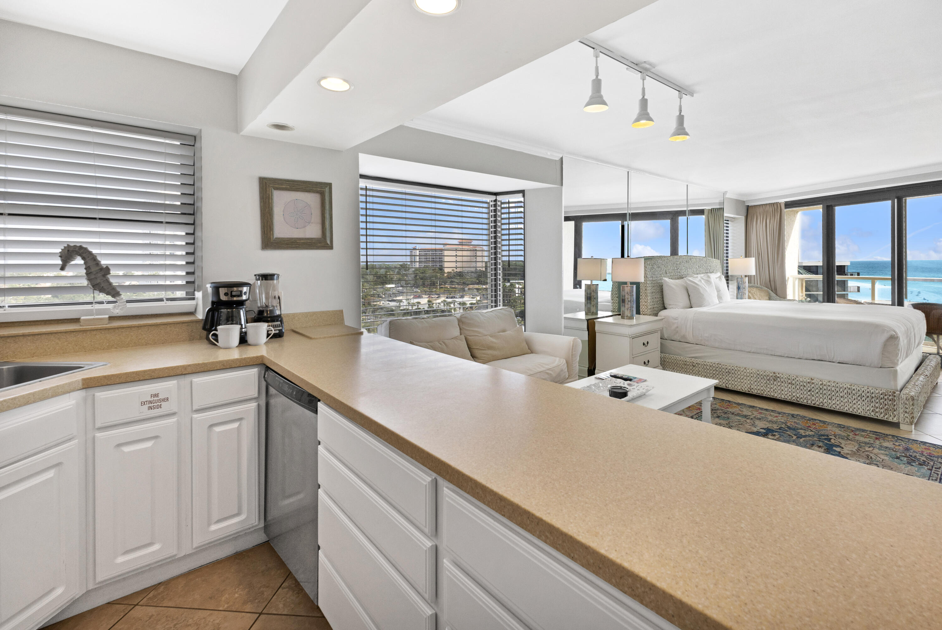 4299 Beachside 2, Unit 4299 Miramar Beach, FL 32550 - Photo 15 of 43 a view of living room with granite countertop furniture and a large window