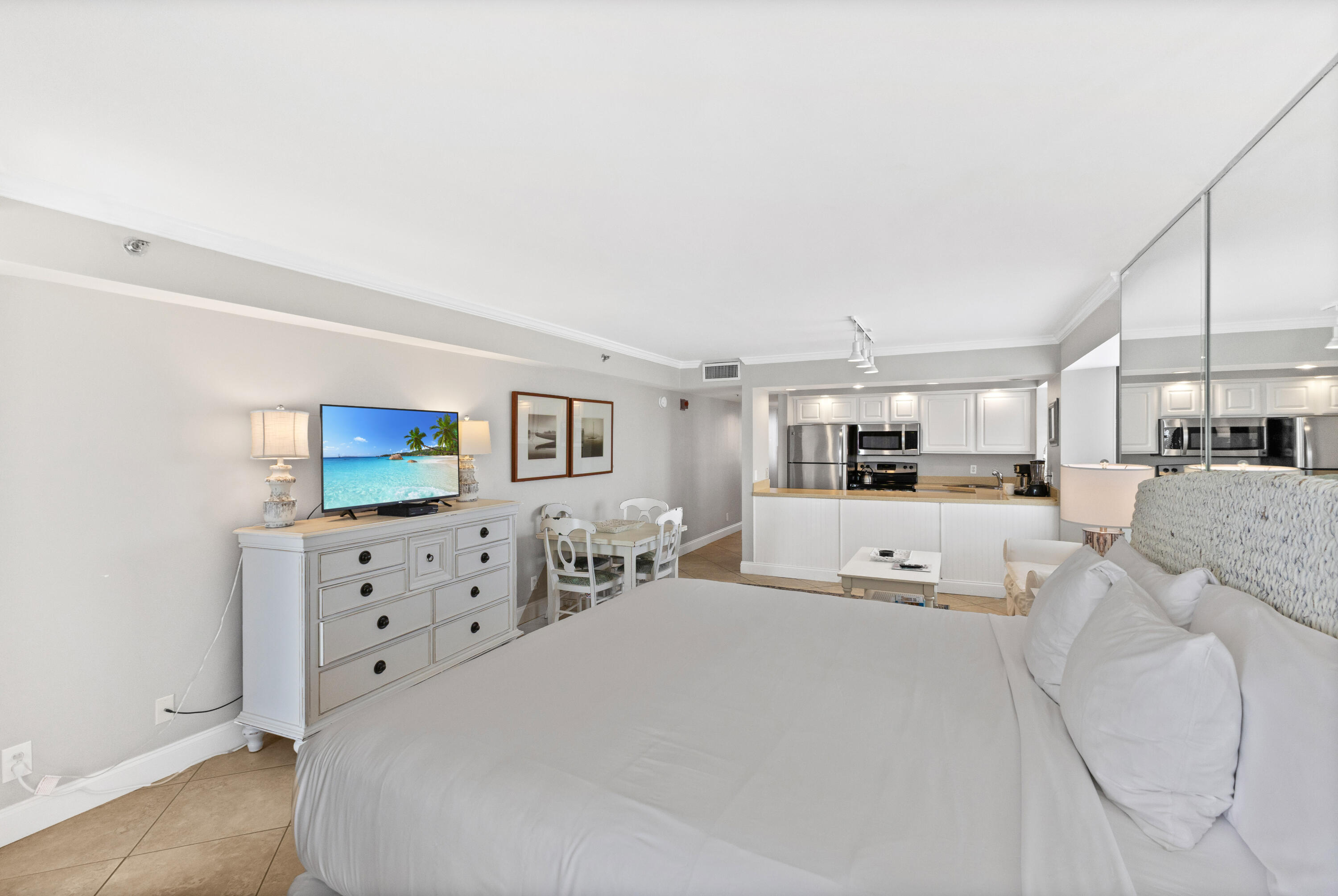 4299 Beachside 2, Unit 4299 Miramar Beach, FL 32550 - Photo 18 of 43 a large white bed in a white bedroom