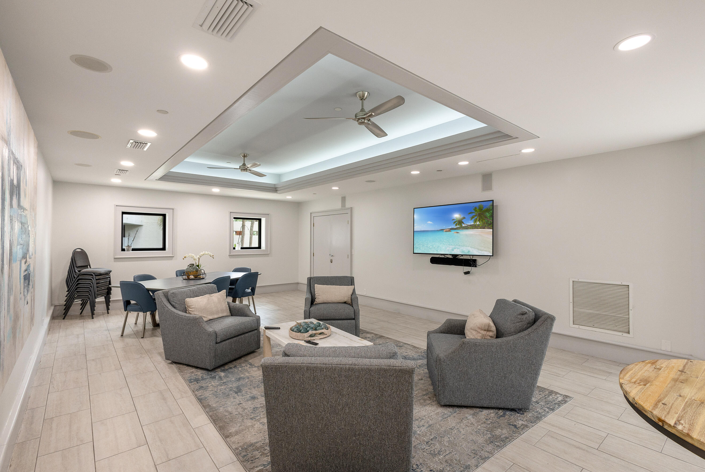 4299 Beachside 2, Unit 4299 Miramar Beach, FL 32550 - Photo 21 of 43 a living room with furniture and a flat screen tv