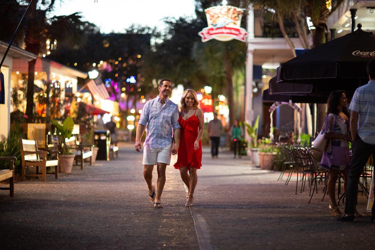 4299 Beachside 2, Unit 4299 Miramar Beach, FL 32550 - Photo 29 of 43 a group of people walking down a street