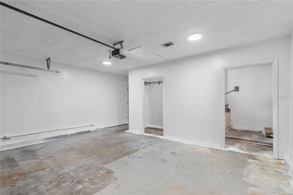 7670 Southwest 80th Place Ocala, FL 34476 - Photo 30 of 44 an empty room with closet and a ceiling fan