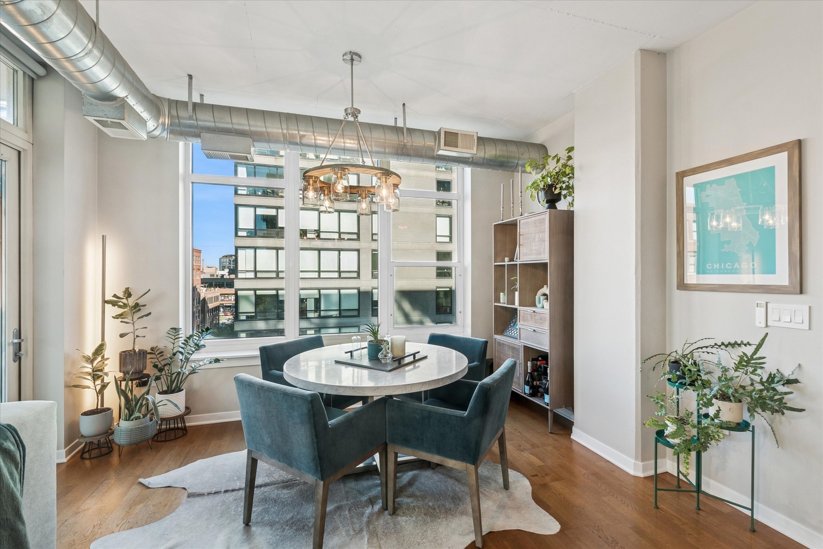 909 West Washington Boulevard, Unit 508 Chicago, IL 60607 - Photo 6 of 20 a view of a dining room with furniture window and outside view