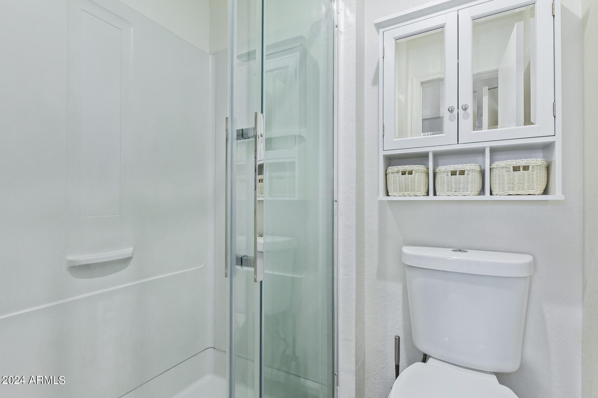 533 West Guadalupe Road, Unit 2046 Mesa, AZ 85210 - Photo 17 of 29 a bathroom with a toilet and a shower