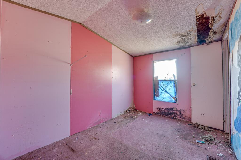 100 Zodiac Strait Road Ferris, TX 75125 - Photo 12 of 19 wooden floor in an empty room