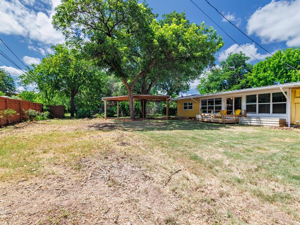 4002 Austin Avenue Brownwood, TX 76801 - Photo 29 of 34 a view of a house with roof deck