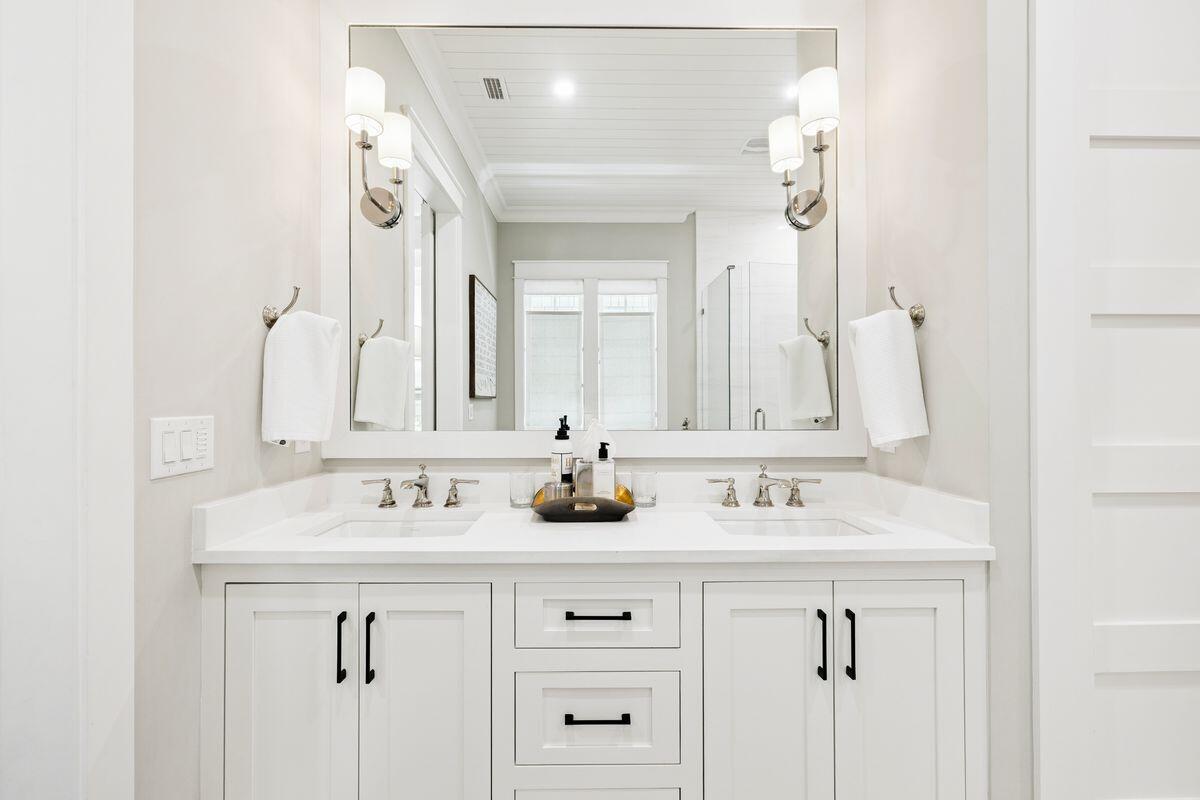 41 North Shingle Lane Watersound, FL 32461 - Photo 14 of 48 a bathroom with double sink and two mirror
