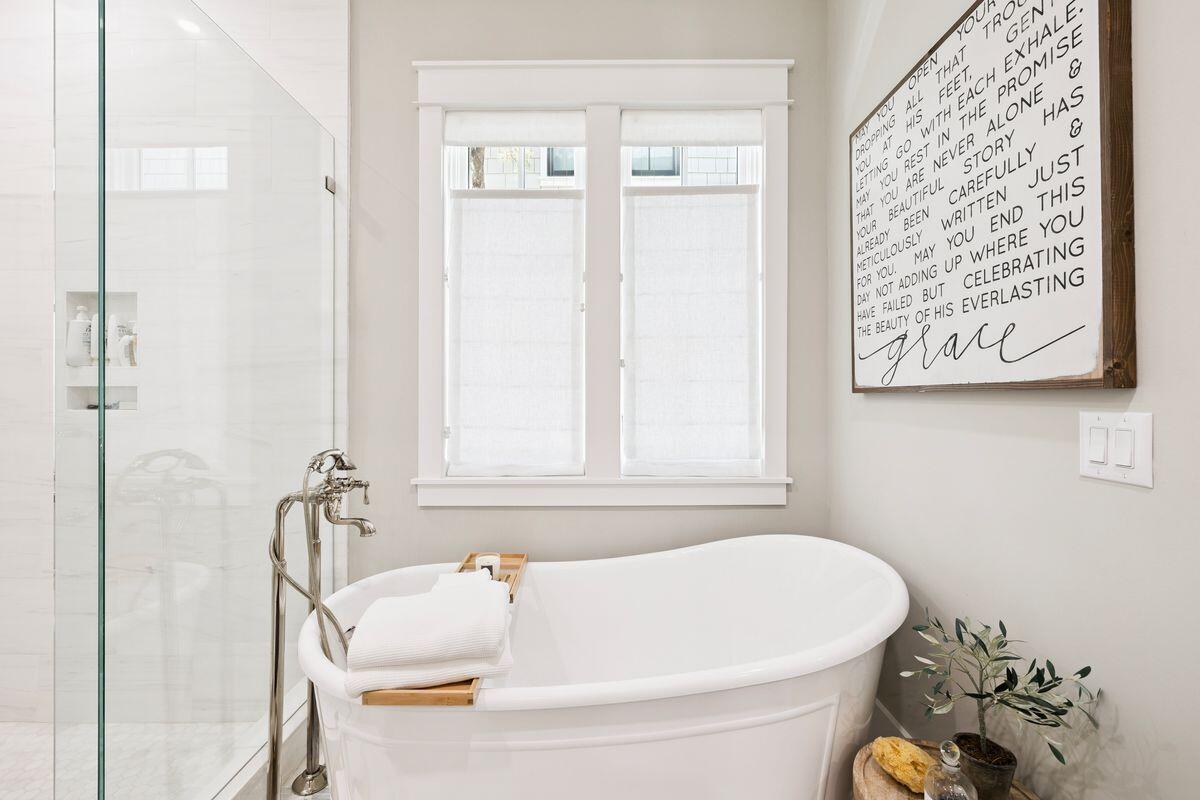 41 North Shingle Lane Watersound, FL 32461 - Photo 15 of 48 a white bath tub sitting next to a white toilet