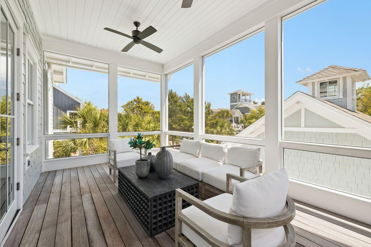 41 North Shingle Lane Watersound, FL 32461 - Photo 24 of 48 a living room with furniture and a large window