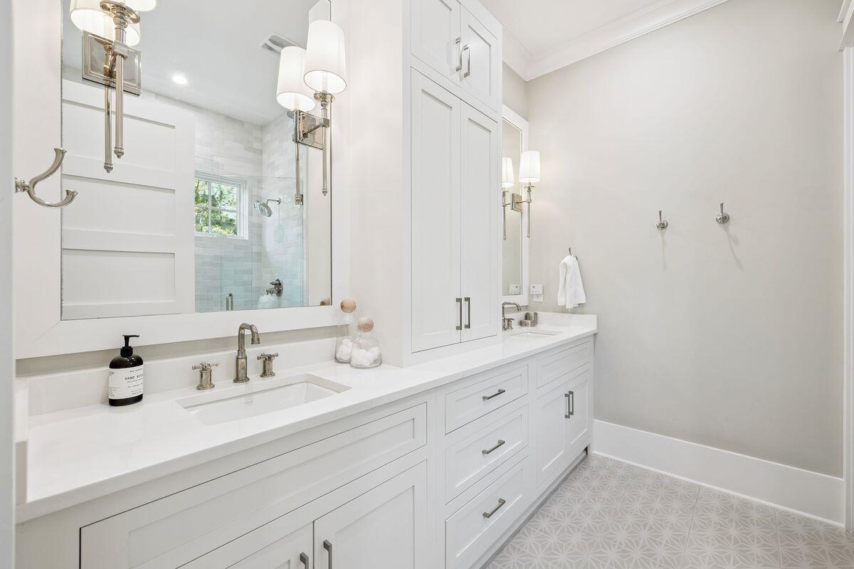 41 North Shingle Lane Watersound, FL 32461 - Photo 27 of 48 a bathroom with double sink and a mirror