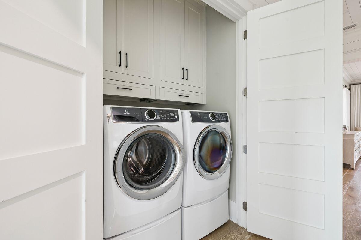 41 North Shingle Lane Watersound, FL 32461 - Photo 29 of 48 a utility room with dryer and washer