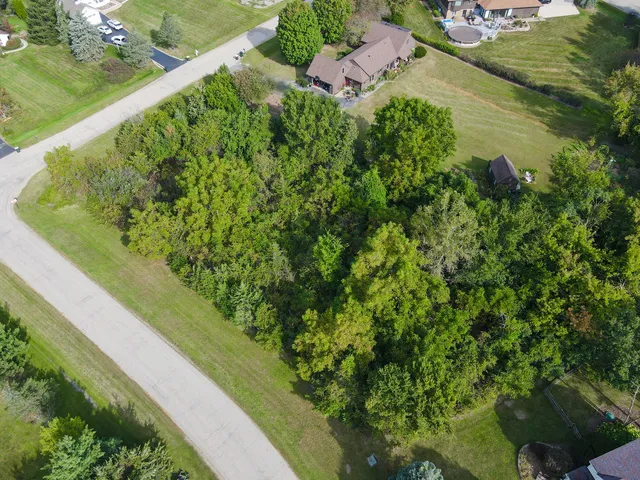 a view of a garden with a lake view