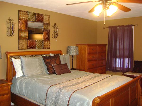 269 Hillcrest Road Northbridge, MA 01588 - Photo 10 of 16 a bedroom with a bed and a painting on the wall