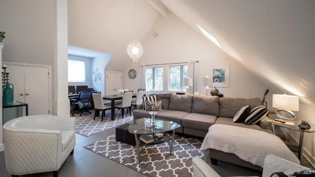 a view of a lake with houses in the background