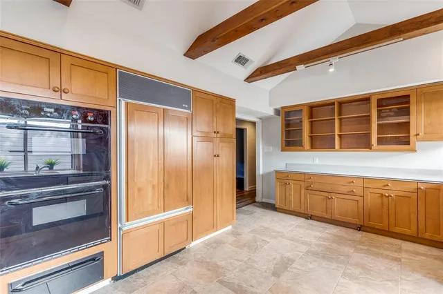 a spacious bathroom with a tub and shower