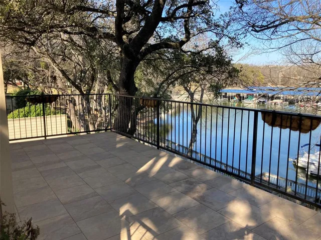 a view of balcony with tree