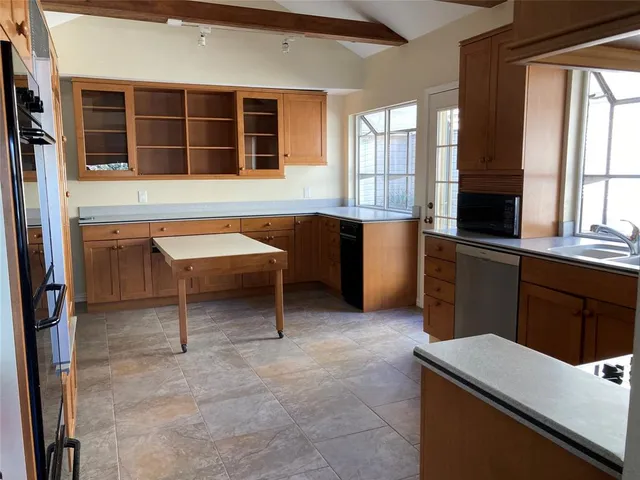 a room with furniture and window