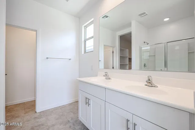 a view of an empty room and closet