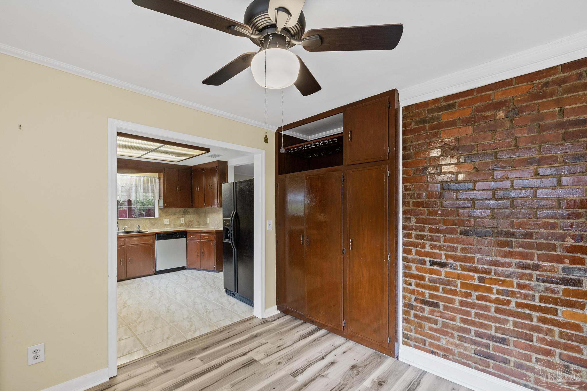 3811 Wilkes Street Pace, FL 32571 - Photo 15 of 59 a bathroom with a granite countertop sink a mirror and shower