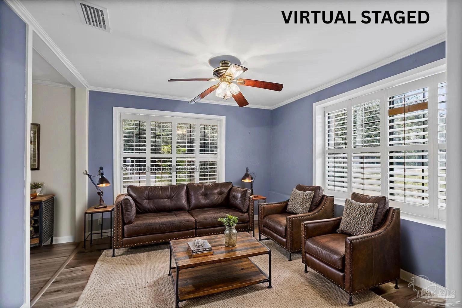 3811 Wilkes Street Pace, FL 32571 - Photo 23 of 59 a living room with furniture and a large window