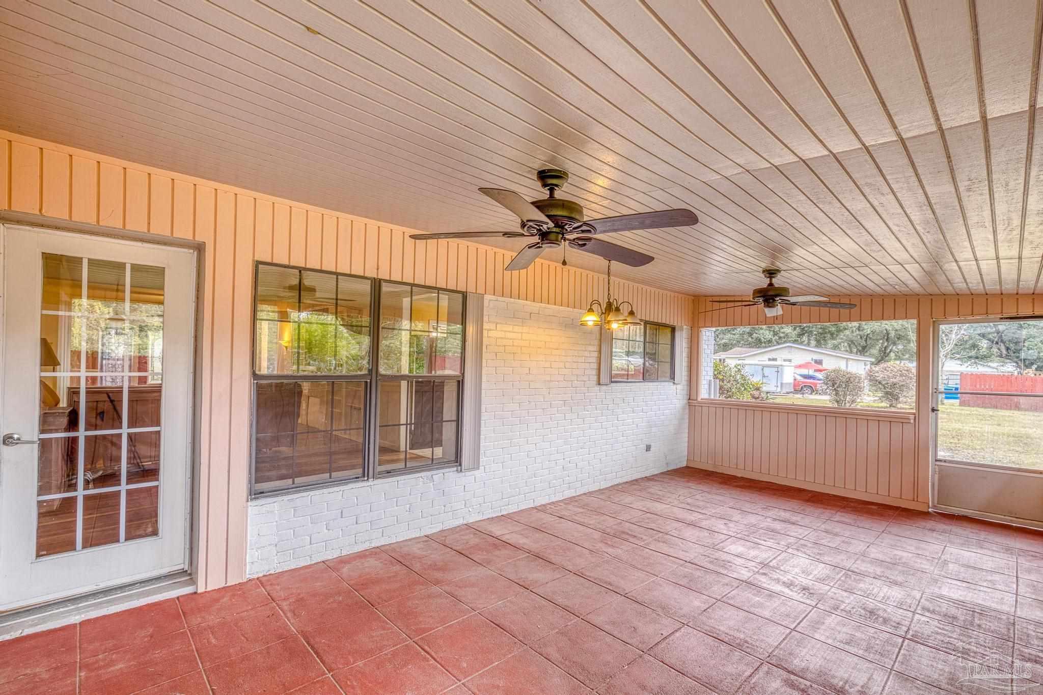 3811 Wilkes Street Pace, FL 32571 - Photo 38 of 59 a view of an empty room with a window