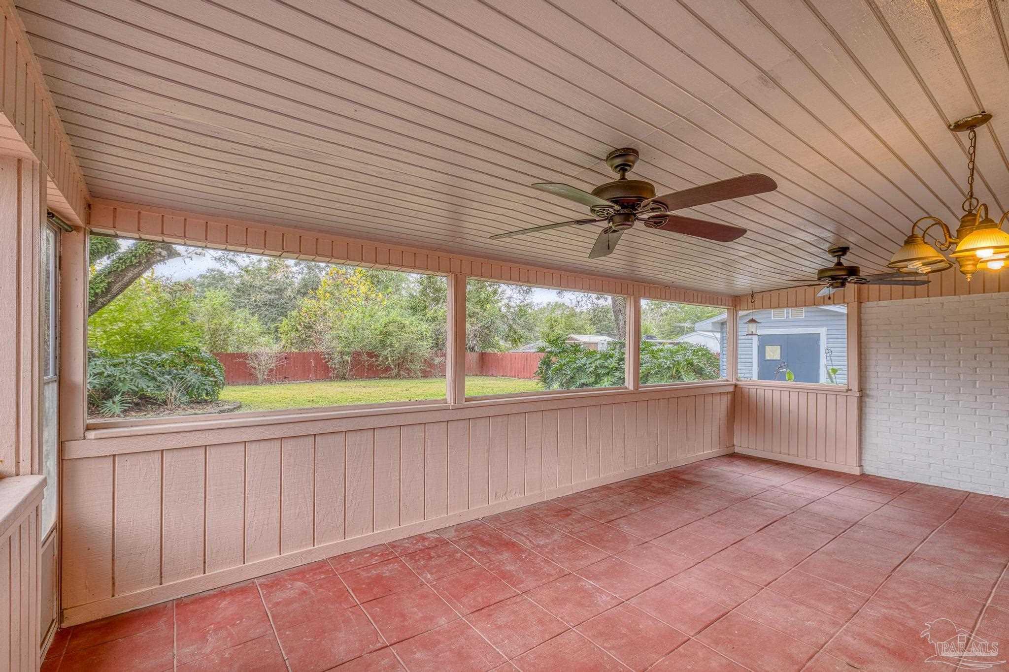 3811 Wilkes Street Pace, FL 32571 - Photo 40 of 59 a view of a deck with a outdoor space