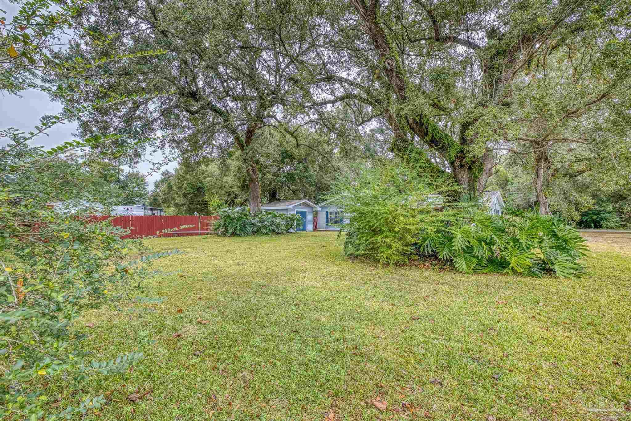 3811 Wilkes Street Pace, FL 32571 - Photo 53 of 59 an outdoor space with garden view