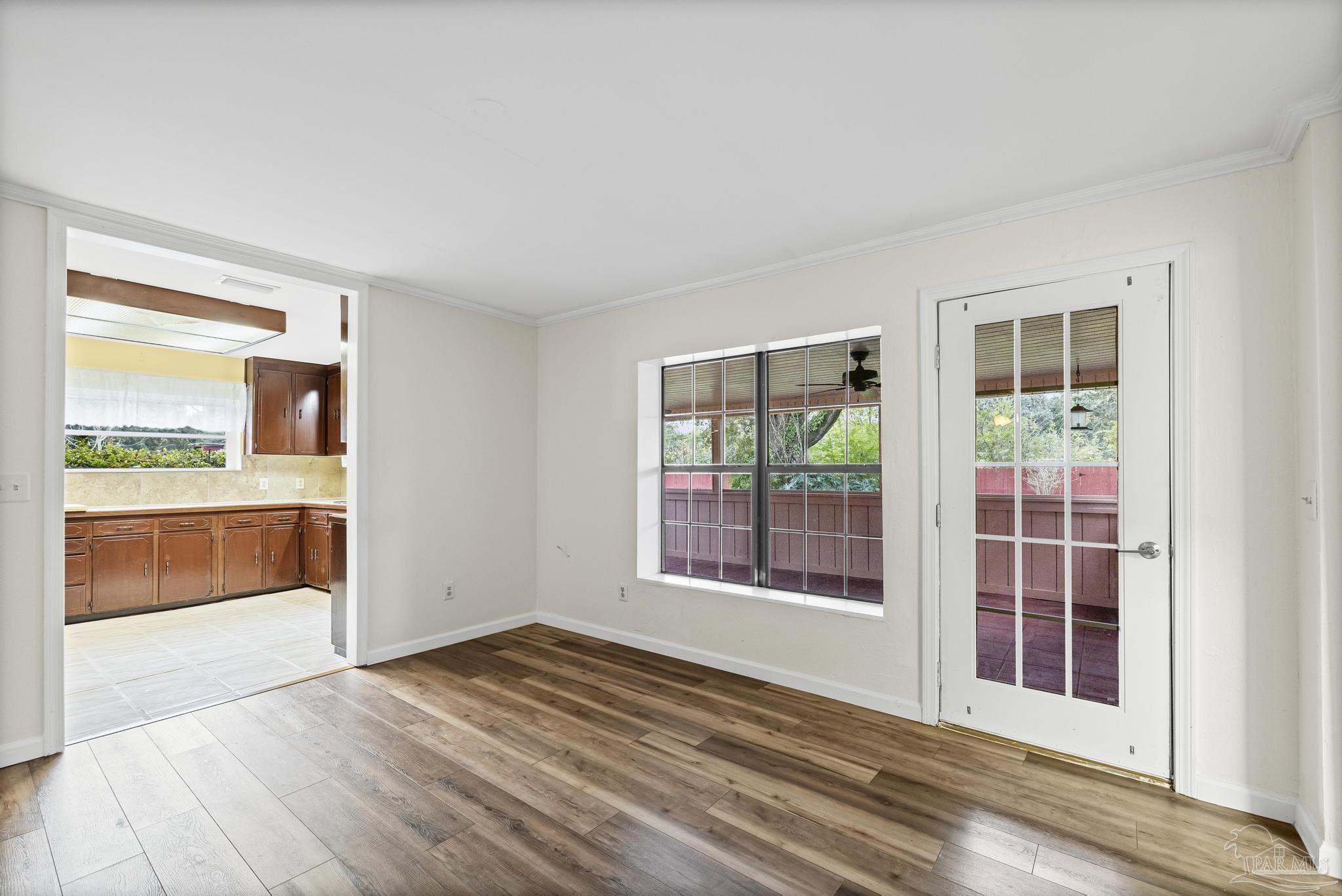 3811 Wilkes Street Pace, FL 32571 - Photo 10 of 59 a view of an empty room with a window