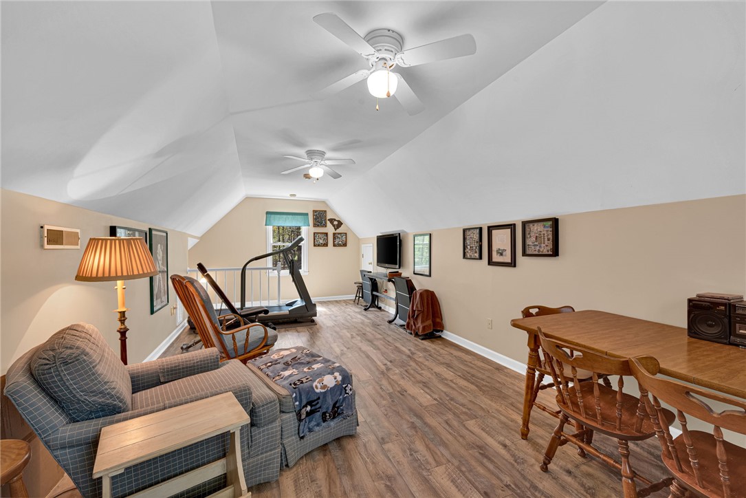 1010 Ridgeview Drive Pendleton, SC 29670 - Photo 36 of 47 This versatile bonus room features sloped ceilings and durable flooring, ideal for various activities.