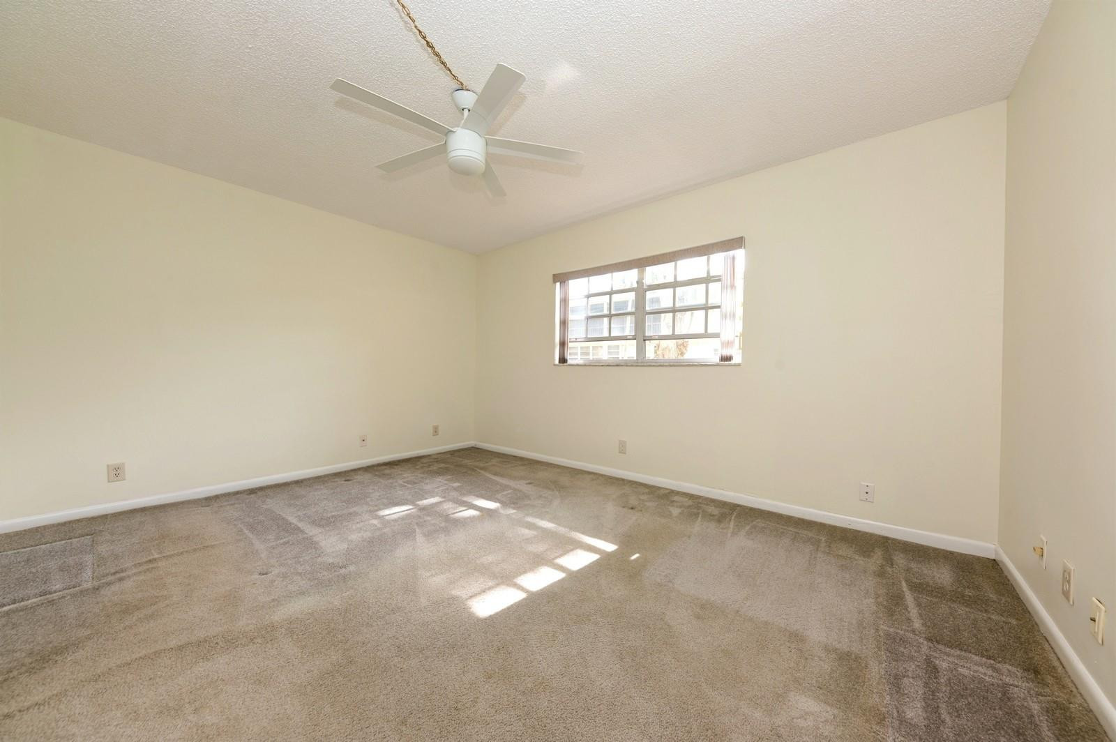 1600 Dover Road, Unit 104B Delray Beach, FL 33445 - Photo 12 of 19 primary bedroom