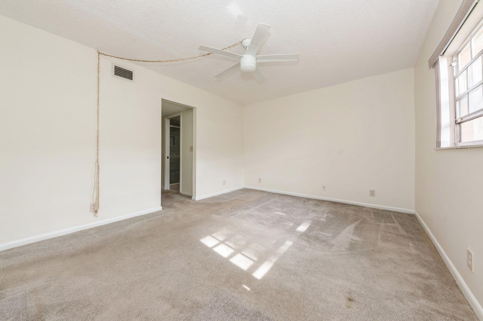 1600 Dover Road, Unit 104B Delray Beach, FL 33445 - Photo 13 of 19 primary bedroom