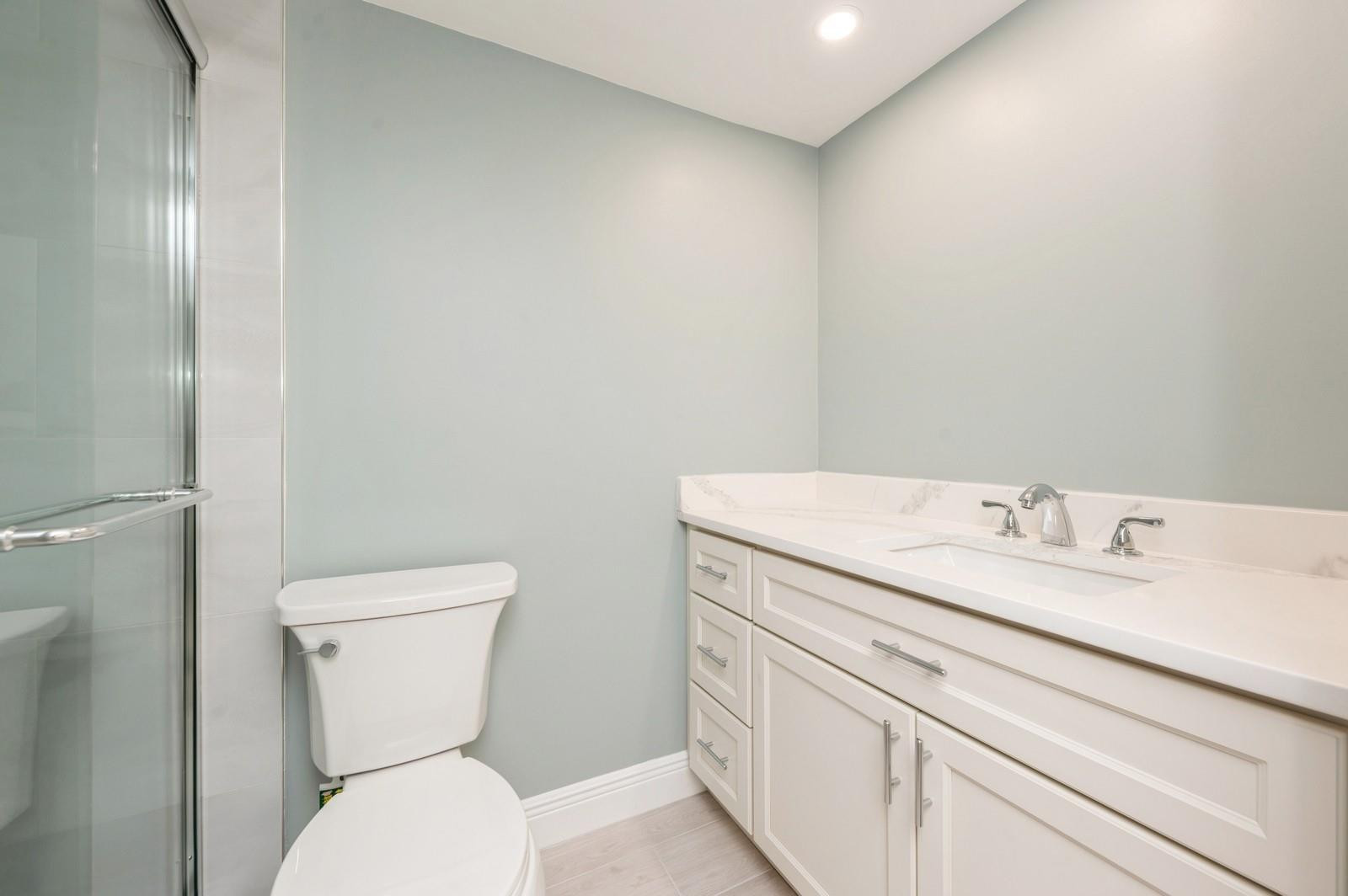 1600 Dover Road, Unit 104B Delray Beach, FL 33445 - Photo 14 of 19 brand new primary bathroom