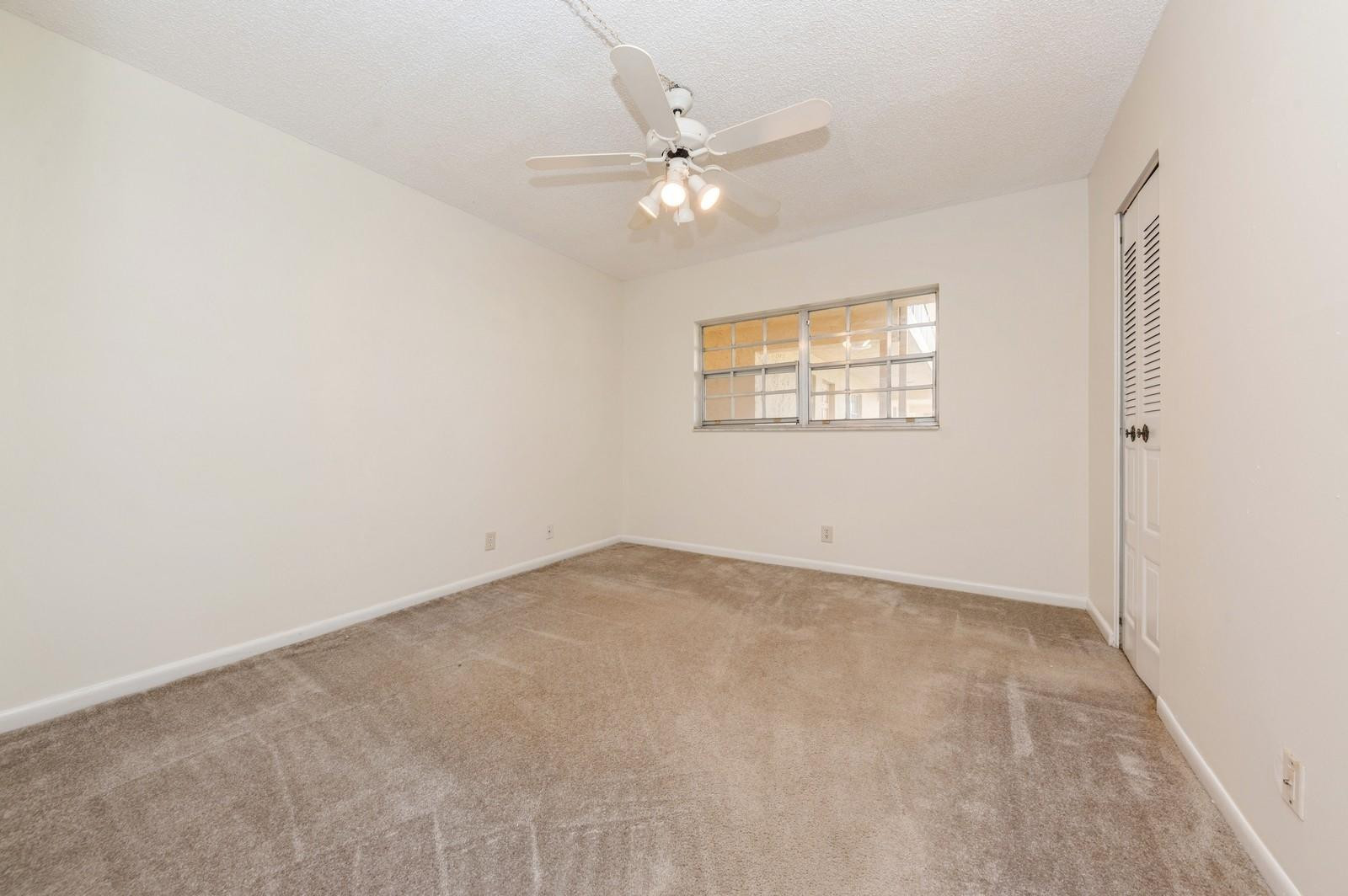 1600 Dover Road, Unit 104B Delray Beach, FL 33445 - Photo 17 of 19 guest bedroom