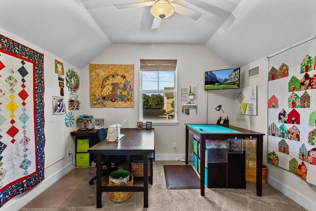 311 E Street St. Augustine, FL 32080 - Photo 19 of 39 a view of a dining room with furniture and chandelier