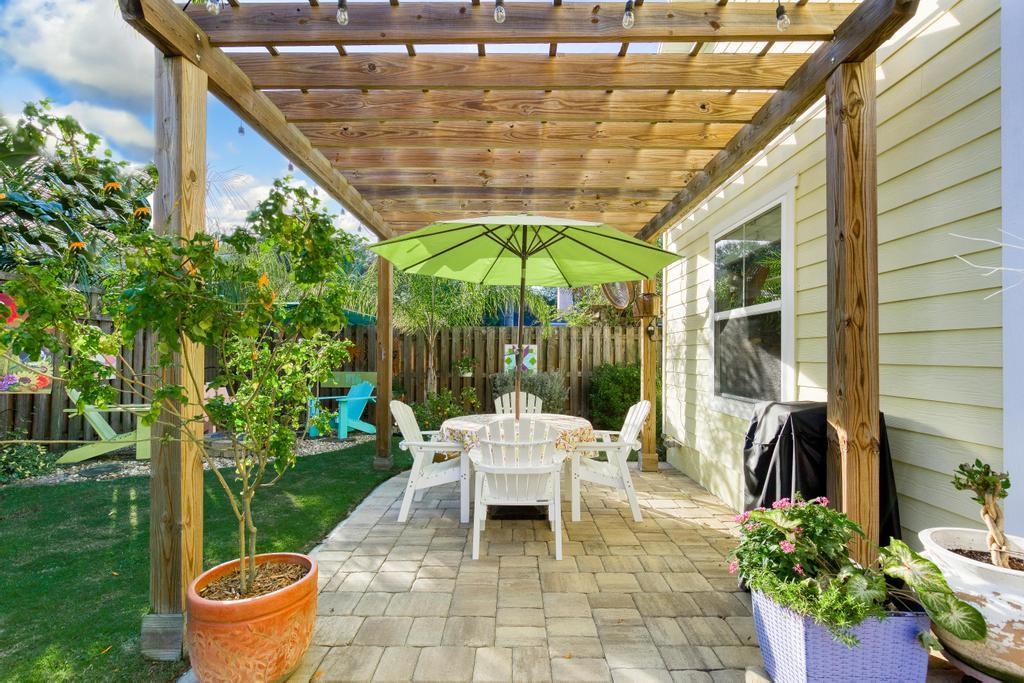 311 E Street St. Augustine, FL 32080 - Photo 27 of 39 a white bench sitting in front of a building