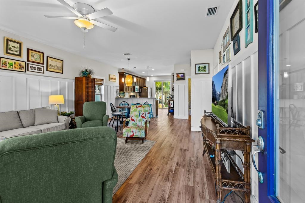 311 E Street St. Augustine, FL 32080 - Photo 5 of 39 a living room with furniture and a flat screen tv