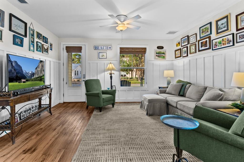 311 E Street St. Augustine, FL 32080 - Photo 7 of 39 a living room with furniture and a flat screen tv