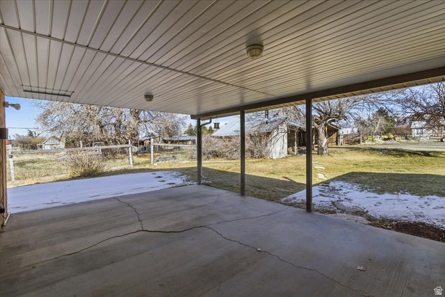 217 East 400 South Spring City, UT 84662 - Photo 48 of 71 Fenced backyard featuring an outdoor structure and a patio area