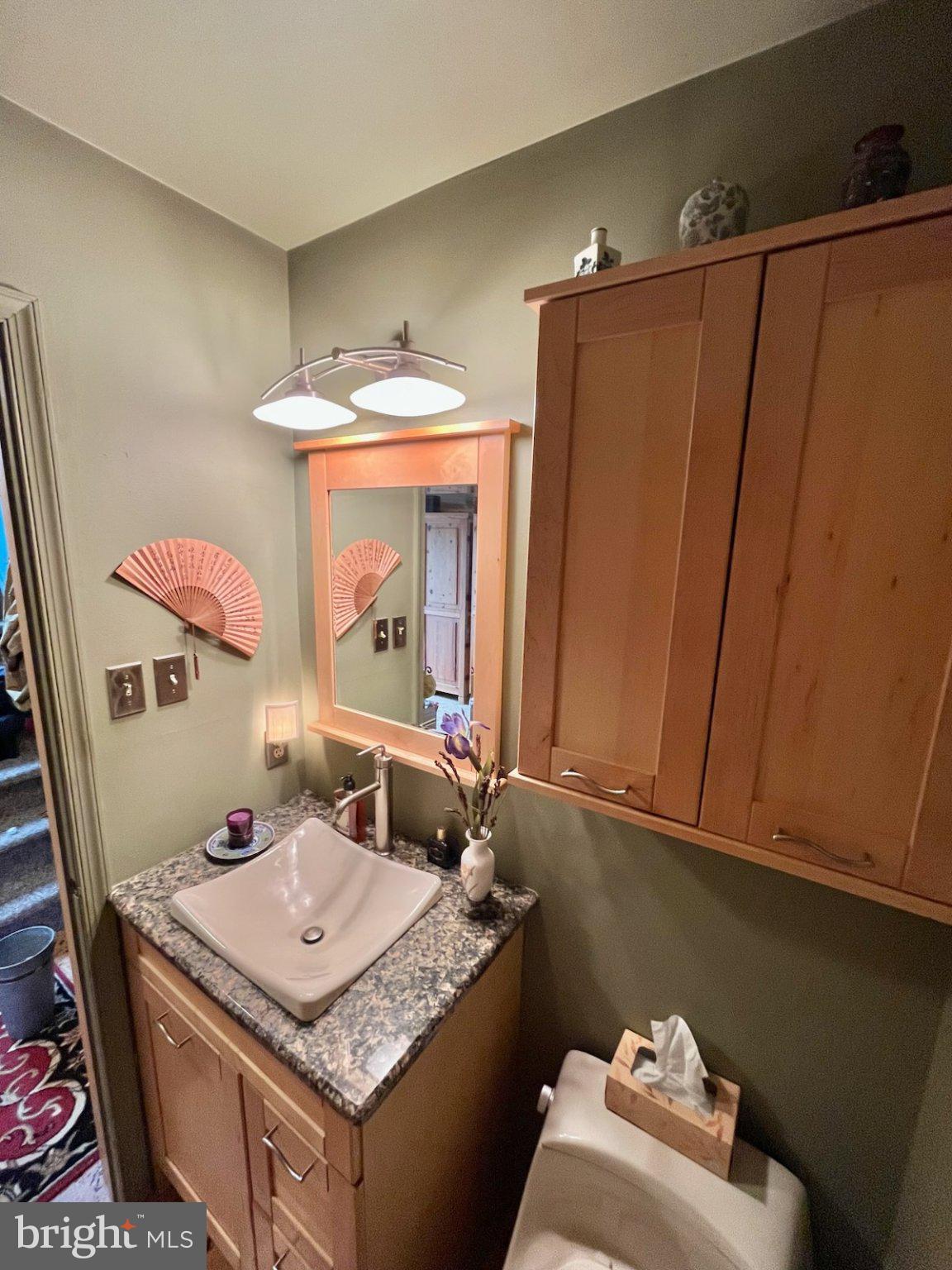 107 Carousel Circle Doylestown, PA 18901 - Photo 14 of 31 a bathroom with a sink and a mirror