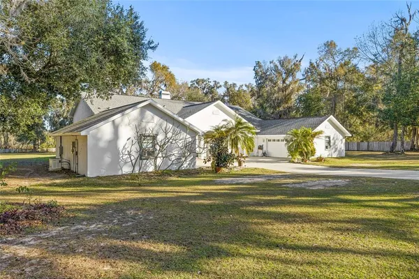 a view of a house with a swimming pool