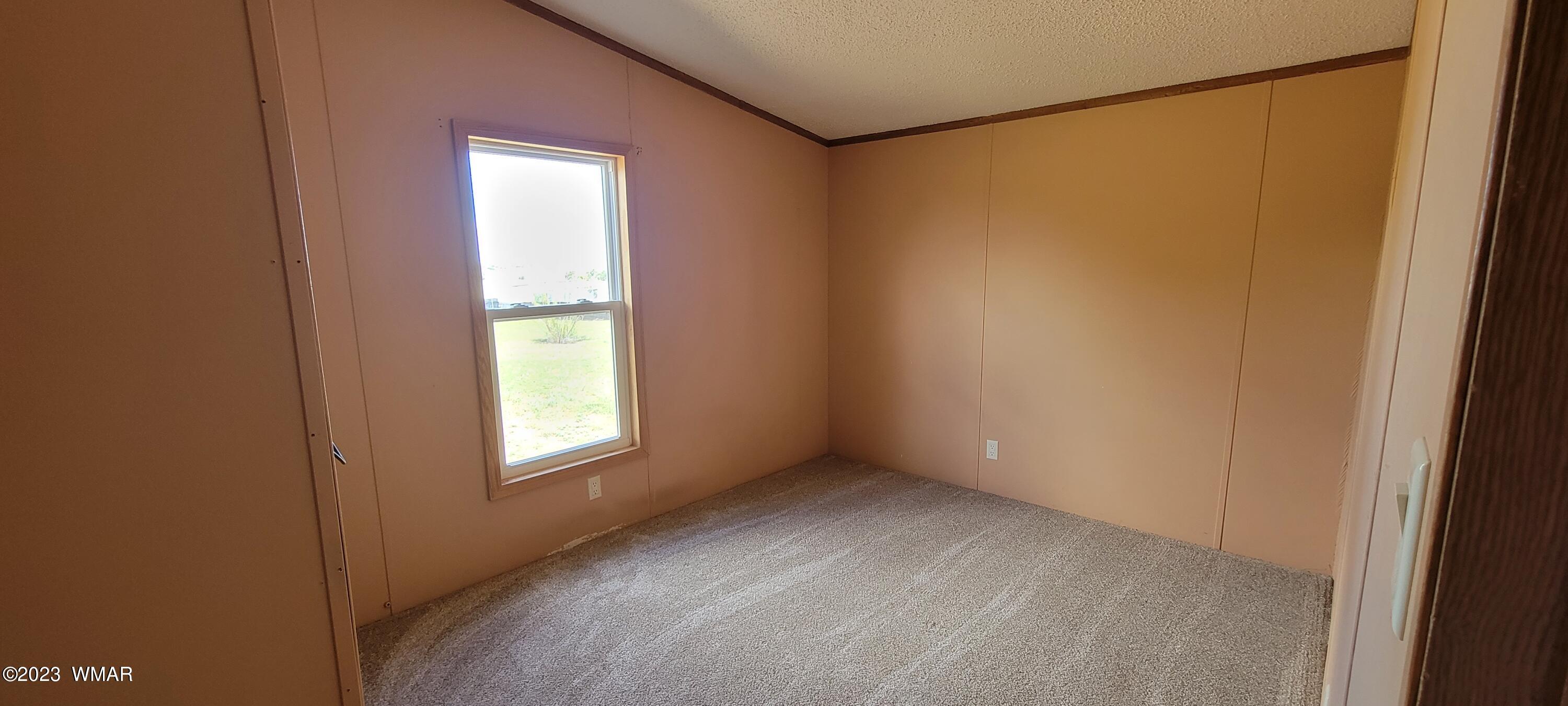 4732 Norris Road Snowflake, AZ 85937 - Photo 21 of 67 a view of an empty room with a window