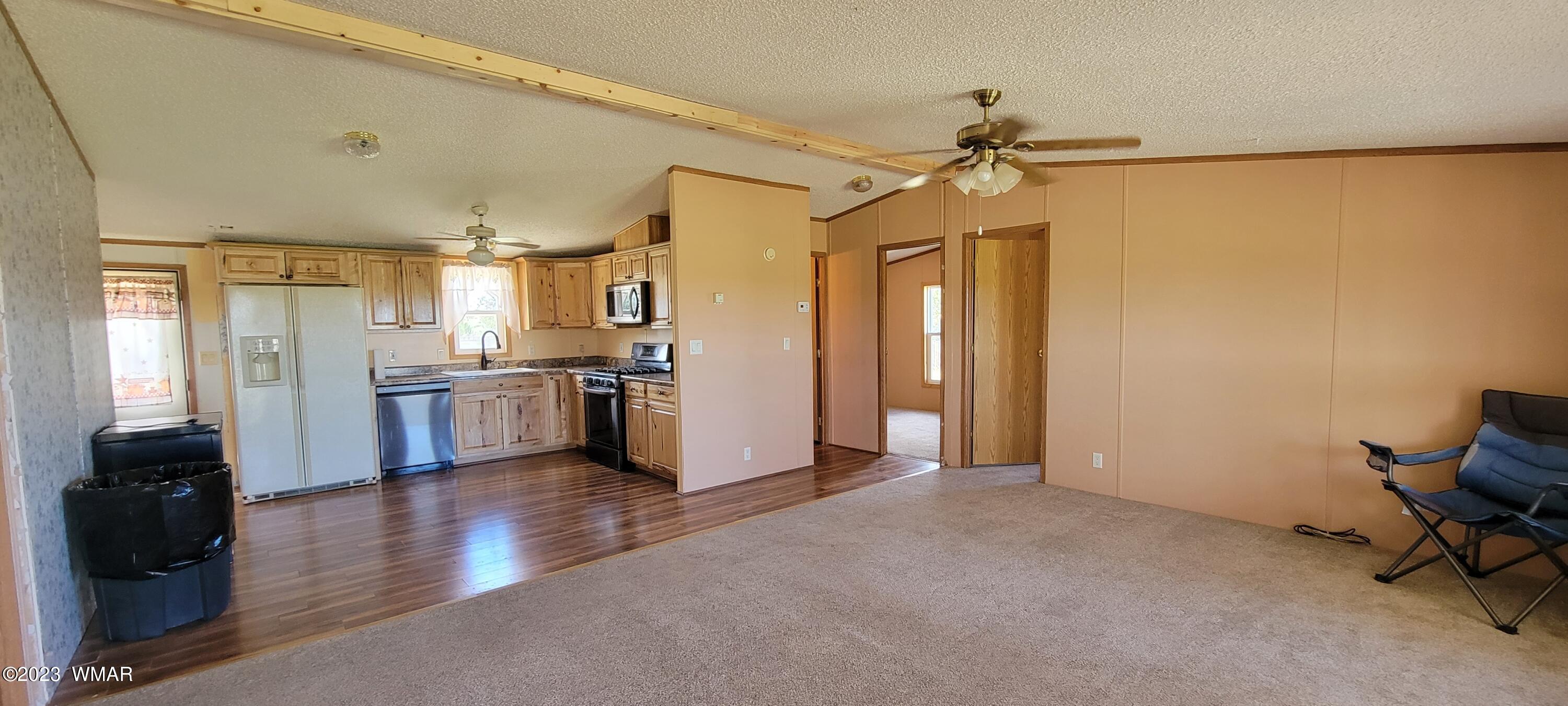 4732 Norris Road Snowflake, AZ 85937 - Photo 3 of 67 a view of a kitchen with wooden floor and a kitchen