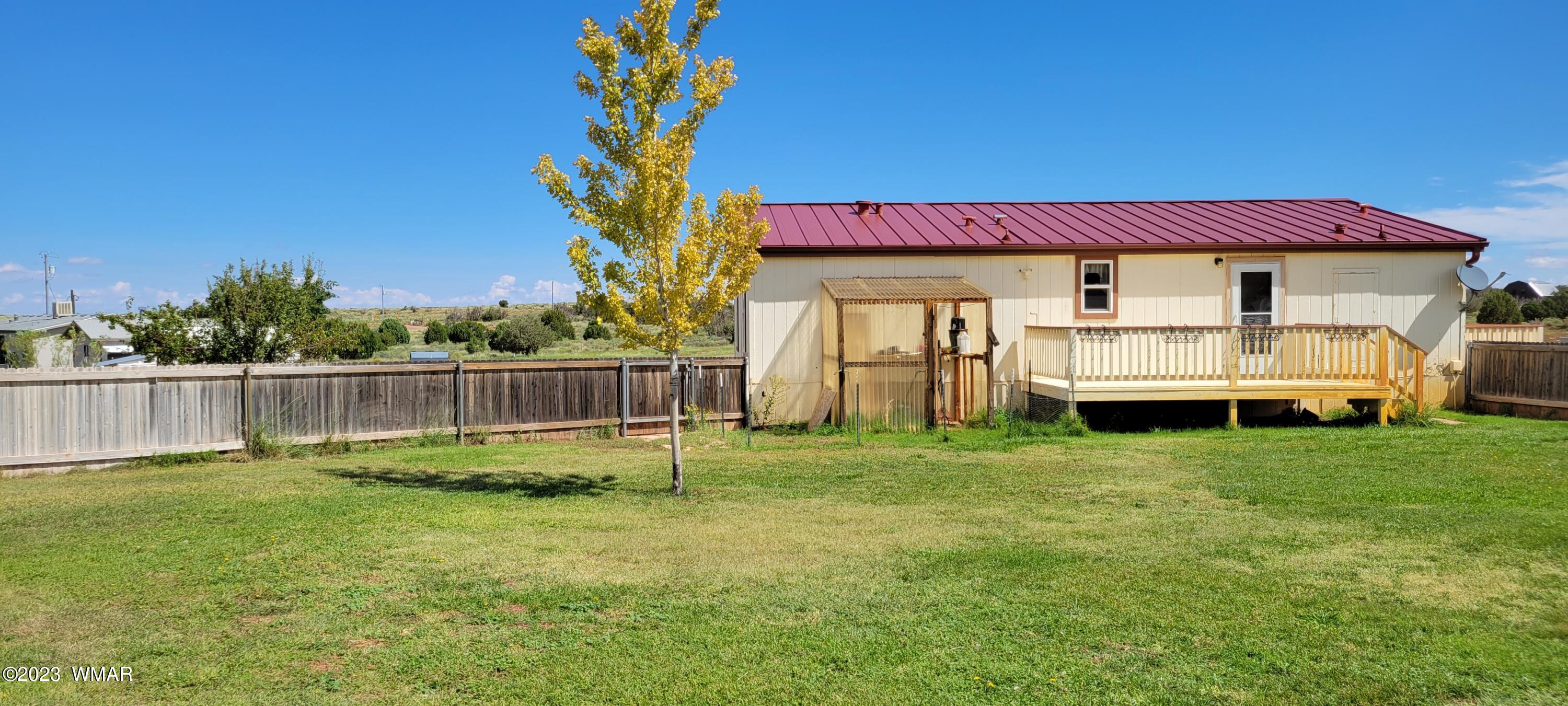 4732 Norris Road Snowflake, AZ 85937 - Photo 34 of 67 a backyard of a house with wooden fence