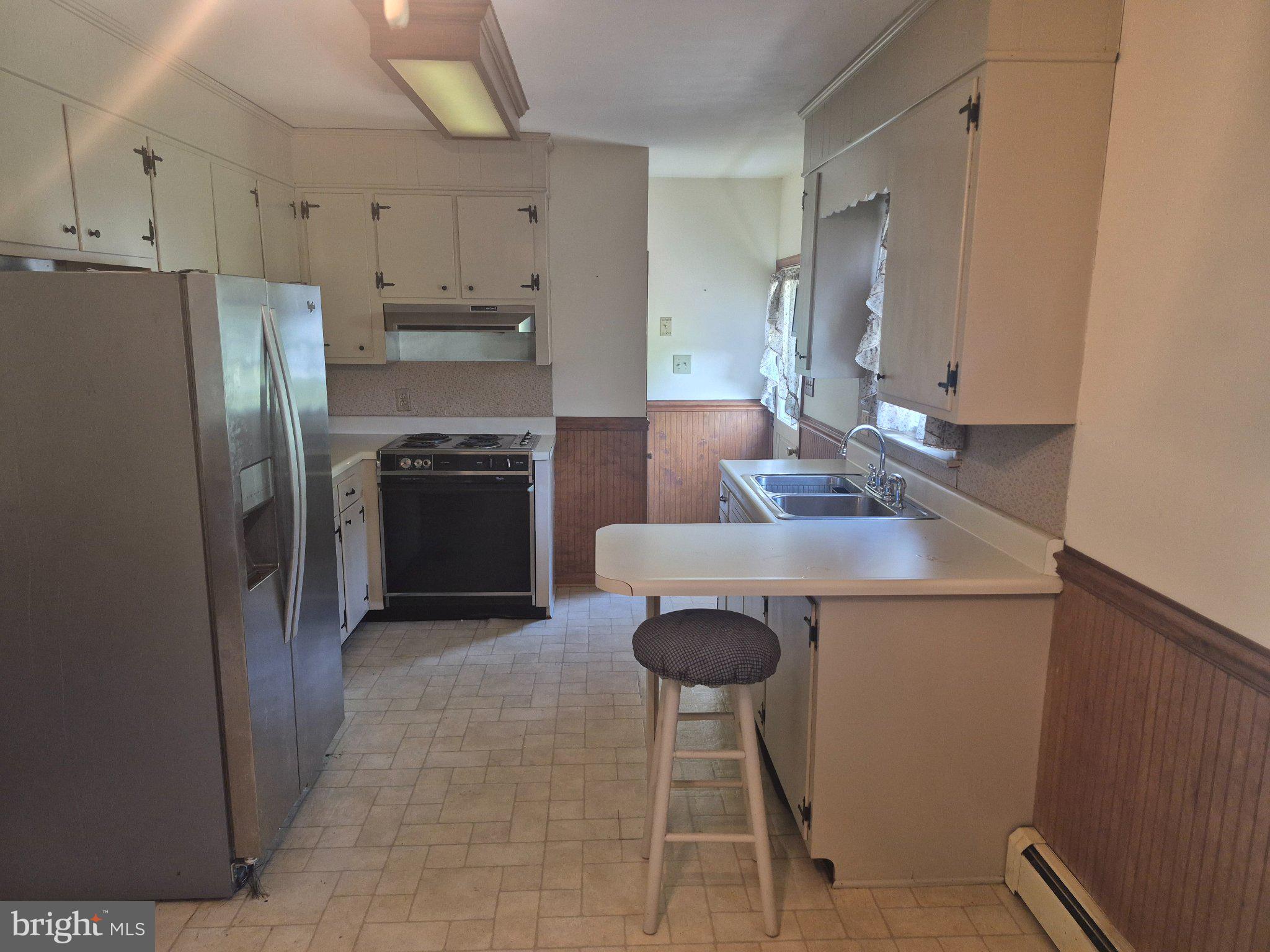 1043 Camp Road Denton, MD 21629 - Photo 4 of 17 Bright and functional kitchen space.